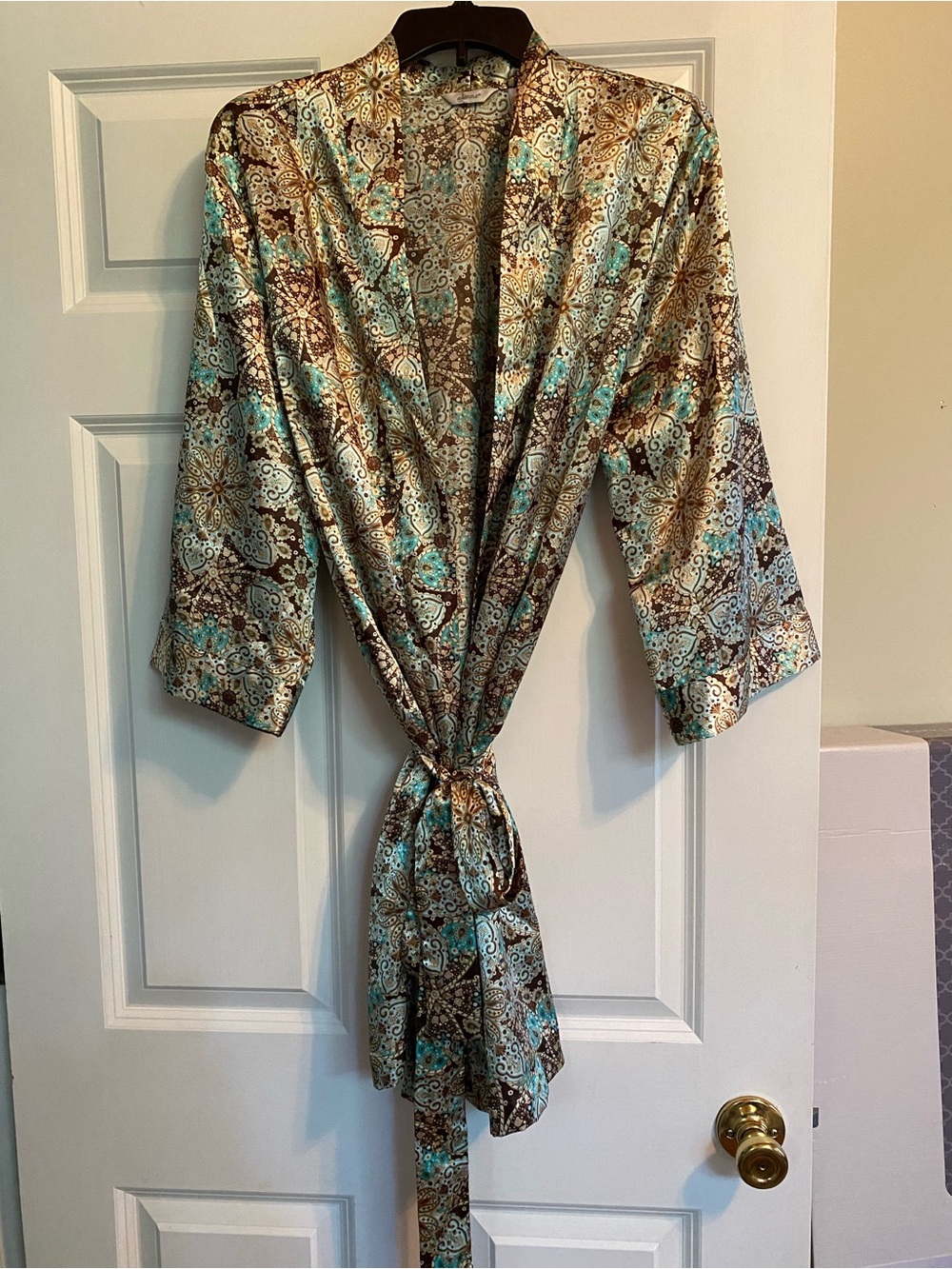 Women's patterned button-down shirt (likely)